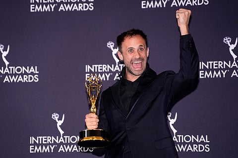 Oriol Pla, winner for Best Performance by an Actor for "Yo, adicto," appears in the press room during the 53rd International Emmy Awards at the New York Hilton Midtown in New York. 