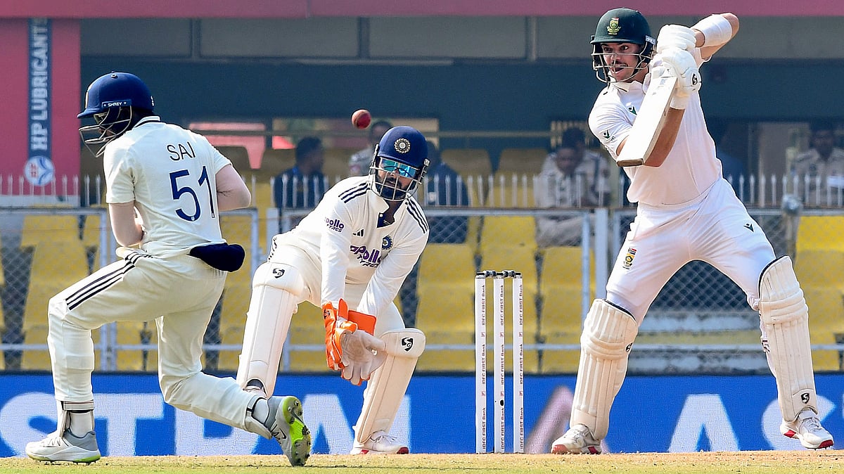 South Africa's Tristan Stubbs plays a shot, right, during the fourth day of the second Test cricket match between India and South Africa, at ACA Stadium, Barsapara in Guwahati, Tuesday, Nov. 25, 2025.  - PTI