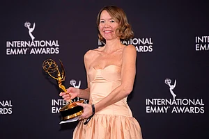 | Photo: Charles Sykes/Invision/AP : Anna Maxwell Martin, winner for Best Performance by an Actress for "Until I Kill You," appears in the press room during the 53rd International Emmy Awards at the New York Hilton Midtown in New York.
