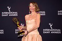 | Photo: Charles Sykes/Invision/AP : Anna Maxwell Martin, winner for Best Performance by an Actress for "Until I Kill You," appears in the press room during the 53rd International Emmy Awards at the New York Hilton Midtown in New York. 