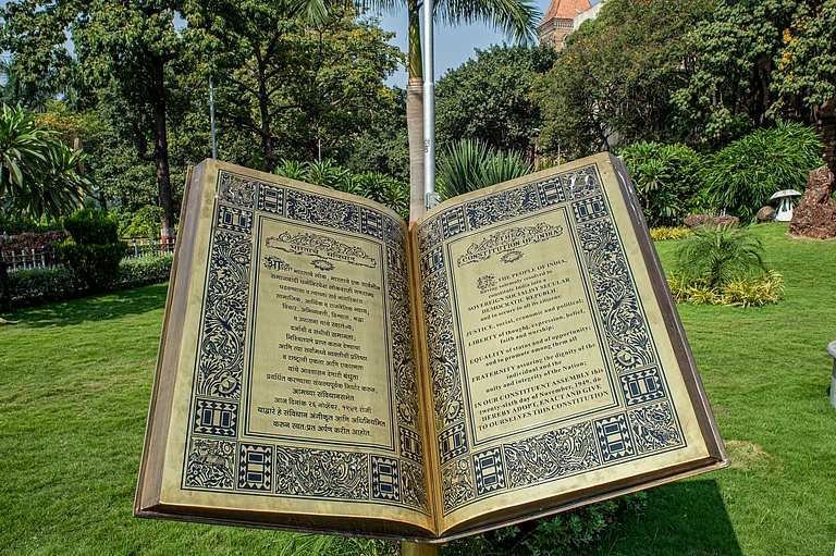 'The Constitution of India' sculpture near statue of Dr Babasaheb Ambedkar at Cooperage circle Mumbai. - Shutterstock