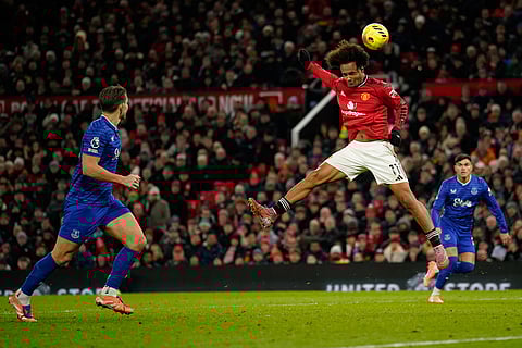 Manchester United's Joshua Zirkzee heads the ball during the English Premier League soccer match between Manchester United and Everton in Manchester, England.