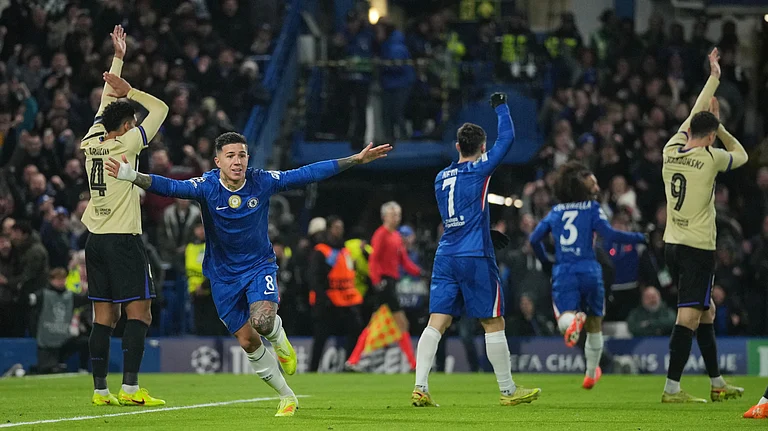 Chelsea's Enzo Fernandez celebrates scoring a goal before it is ruled out using VAR during the UEFA Champions League opening phase match against Barcelona on November 25, 2025. - | Photo: AP/Kin Cheung