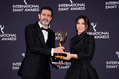Asef Hamidi, left, and Fairouz Ziani, winners in the News category for "Gaza, Search for Life," appear in the press room during the 53rd International Emmy Awards at the New York Hilton Midtown in New York. 