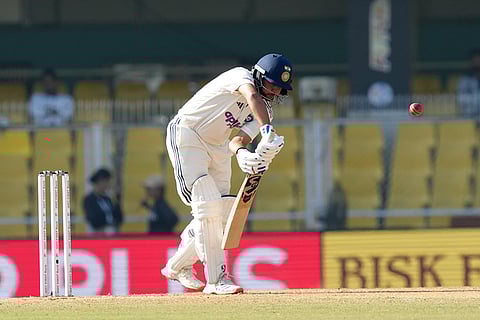 India's Kuldeep Yadav plays a shot during the fifth day of the second Test cricket match between India and South Africa, at ACA Stadium, Barsapara in Guwahati.
