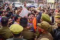 PTI                          : Jammu and Kashmir Police stop Bajrang Dal activists during a protest against the Shri Mata Vaishno Devi Shrine Board (SMVDSB), in Jammu, Monday, Nov. 24, 2025 