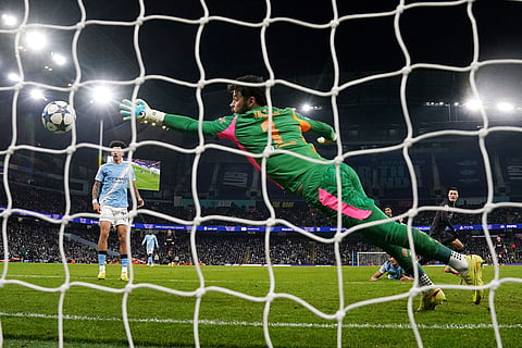 Leverkusen's Patrik Schick, right, scores their side's second goal during the Champions League opening phase soccer match between Manchester City and Bayer Leverkusen in Manchester, England.
