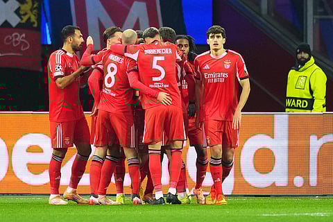 Benfica players celebrate after Benfica's Samuel Dahl scored his side's opening goal during the Champions League opening phase soccer match between Ajax and SL Benfica in Amsterdam, Netherlands.