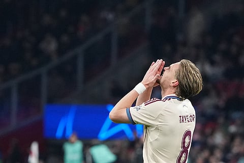 Ajax's Kenneth Taylor reacts after missing a scoring chance during the Champions League opening phase soccer match between Ajax and SL Benfica in Amsterdam, Netherlands.