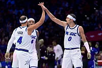 Philadelphia 76ers 144-103 Orlando Magic, NBA Cup 2025: Anthony Black Stars In Victory | Photo: AP/Chris Szagola : Orlando Magic's Anthony Black, right, celebrates with Jalen Suggs, left, and Wendell Carter Jr., center, during the first half of an NBA Cup basketball game against the Philadelphia 76ers in Philadelphia.