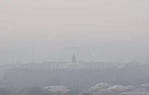PTI : New Delhi: Samvidhan Sadan engulfed in a layer of smog