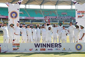| Photo: AP/Anupam Nath : South Africa's cricket team celebrates with the trophy after winning the test series against India in Guwahati.