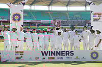 | Photo: AP/Anupam Nath : South Africa's cricket team celebrates with the trophy after winning the test series against India in Guwahati.