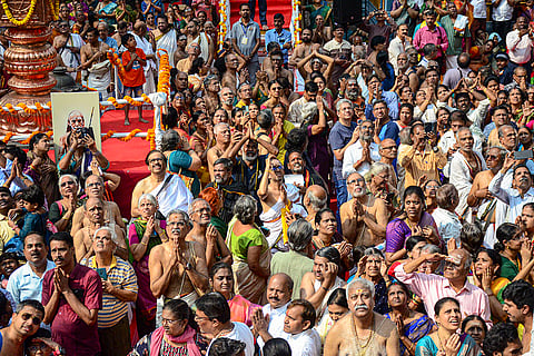 Devotees gather to offer prayers during the 3rd Jeernodhaarana Ashtabandhana Maha Kumbhabhishekam, in Navi Mumbai.