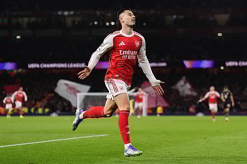 Arsenal's Gabriel Martinelli celebrates after scoring his side's third goal during the Champions League opening phase soccer match between Arsenal and Bayern Munich in London.