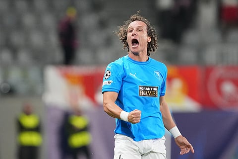 Pafos' David Luiz celebrates after scoring his side's opening goal during the Champions League opening phase soccer match between Pafos FC and AS Monaco in Limassol, Cyprus.