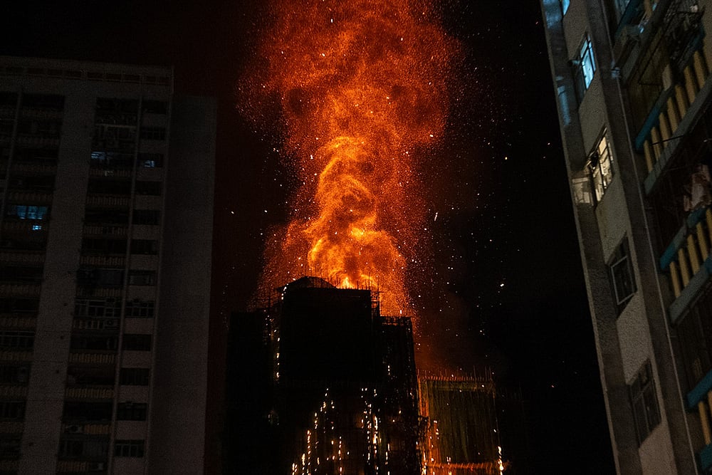 | Photo: AP/Chan Long Hei : Flames engulf a building after a fire broke out at Wang Fuk Court, a residential estate in the Tai Po district of Hong Kong's New Territories.