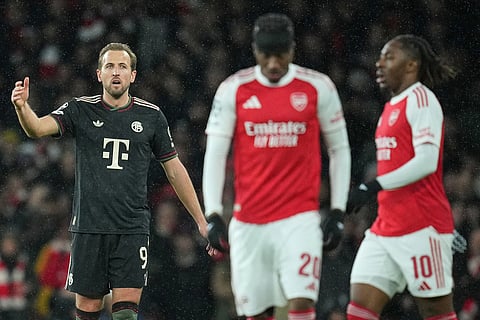 Bayern's Harry Kane gestures during the Champions League opening phase soccer match between Arsenal and Bayern Munich in London.