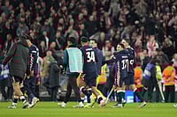 | Photo: AP/Jon Super : PSV's team players celebrate after the Champions League opening phase soccer match between Liverpool and PSV in Liverpool, England.