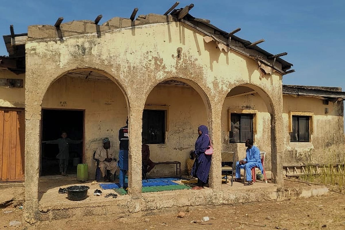 Tunde Omolehin : Mourners gather at the house of Hassan Yakubu Makuku, vice principal of the Government Girls Comprehensive Secondary School, where gunmen on Monday attacked the school dormitory, abducted schoolgirls, and killed him, in Kebbi, Nigeria, Tuesday, Nov. 18, 2025