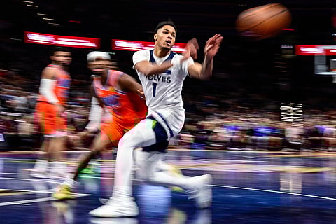 Minnesota Timberwolves guard/forward Terrence Shannon Jr. (1) pass the ball against Oklahoma City Thunder during the second half of an Emirates NBA Cup basketball game in Oklahoma City. 