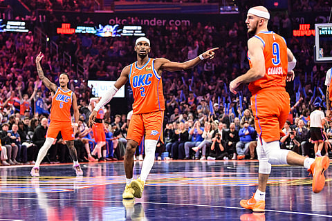 Oklahoma City Thunder guard Shai Gilgeous-Alexander (2) gestures against the Minnesota Timberwolves during the first half of an Emirates NBA Cup basketball game, in Oklahoma City. 