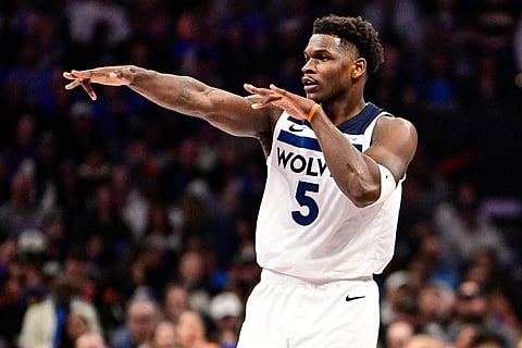 Minnesota Timberwolves guard Anthony Edwards (5) celebrates against the Oklahoma City Thunder during the second half of an Emirates NBA Cup basketball game in Oklahoma City. 