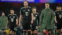 | Photo: AP/Kin Cheung : Bayern's Harry Kane and Joshua Kimmich leave the pitch after the UEFA Champions League opening phase match against Arsenal on November 26, 2025.