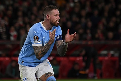 Malmo's Pontus Jansson reacts after Nottingham Forest's Nikola Milenkovic's goal was given after a var review, during the Europa League opening phase soccer match between Nottingham Forest and Malmo in Nottingham, England.