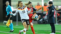 Germany 0-0 Spain Highlights, UEFA Women’s Nations League Final Leg 1: Wasteful Hosts Held To Goalless Draw By La Roja | Photo: dpa/Uwe Anspach via AP : Germany's Selina Cerci and Spain's Olga Carmona fight for the ball during the UEFA Women's Nations League match on November 28, 2025