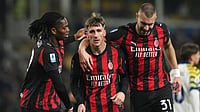 | Photo: Massimo Paolone/LaPresse via AP : AC Milan's Alexis Saelemaekers, center, celebrates with Rafael Leao, left, and Strahinja Pavlovic after scoring his side's opening goal during the Serie A soccer match between Parma and Milan in Parma, Italy.
