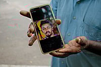 The Big Blind Spot: How Caste Still Shapes Tamil Nadu's Society | Photo: Subash Sagar : Faces of Tragedy: Chinnakannu shows the picture of his son