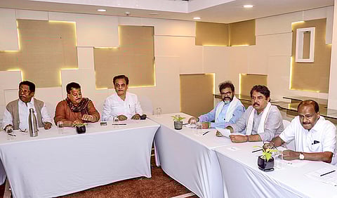 Union Minister H D Kumaraswamy, extreme right, Leader of Opposition in Karnataka Legislative Assembly R. Ashoka, second from right, Leader of the Opposition in the state Legislative Council Chalavadi Narayanaswamy, third from right, and others during a coordination meeting of BJP and JD(S) leaders ahead of the state Assembly's winter session, in Bengaluru, Karnataka.