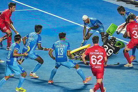 Players of India (in blue) and Chile vie for the ball during the FIH Hockey Men's Junior World Cup 2025 match, at Mayor Radhakrishnan Hockey Stadium, in Chennai, Tamil Nadu.