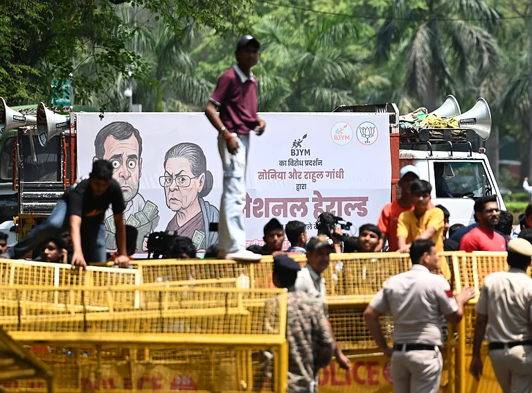 The chargesheet lists Sonia Gandhi, Rahul Gandhi, Pitroda, Dubey, Sunil Bhandari, Young Indian, and Dotex Merchandise Pvt Ltd as accused. - IMAGO/ Hindustan Times; Representational image