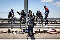 Peru Declares State of Emergency as Migrants Flee Chile Ahead Of Kast Run-Off AP Photo/Ibar Silva : Migrants, mostly from Venezuela, wait to cross into Peru at the Chacalluta border crossing point in Arica, Chile, Friday, Nov. 28, 2025.