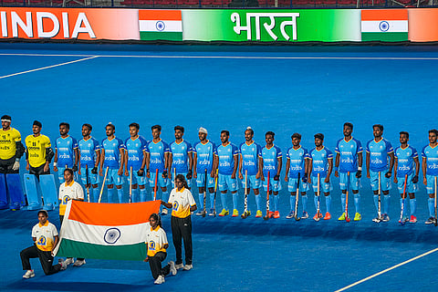 India's players stand for the national anthem before the start of the FIH Hockey Men's Junior World Cup 2025 match against Chile, at Mayor Radhakrishnan Hockey Stadium, in Chennai, Tamil Nadu.