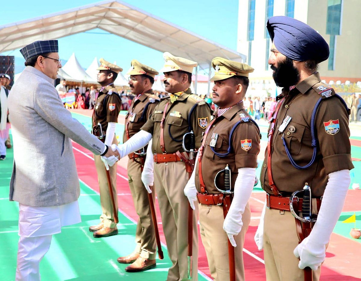 Uttarakhand State Formation Day Celebrations Chamoli, Nov 10 (ANI): Uttarakhand Chief Minister Pushkar Singh Dhami interacts with police officers during the Silver Jubilee Celebration of Uttarakhand Formation Day, in Chamoli on Monday.  - IMAGO / ANI News