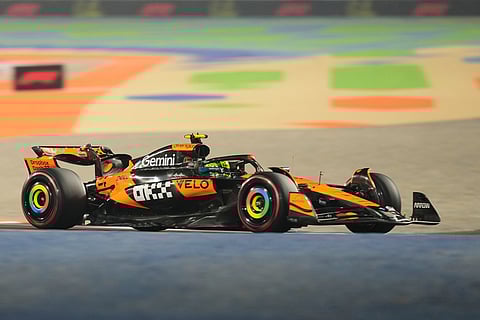 McLaren driver Lando Norris of Britain steers his car during the qualifying session ahead of the Qatar Formula One Grand Prix, at the Lusail International Circuit, in Lusail, Qatar.