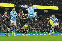 English Premier League 2025-26: Man City Earn Hard-Fought Victory Over Leeds United As Phil Foden Shines With Twin Goals | Photo: AP/Ian Hodgson : Manchester City's Phil Foden, right, scores during the English Premier League soccer match between Manchester City and Leeds United in Manchester, England.