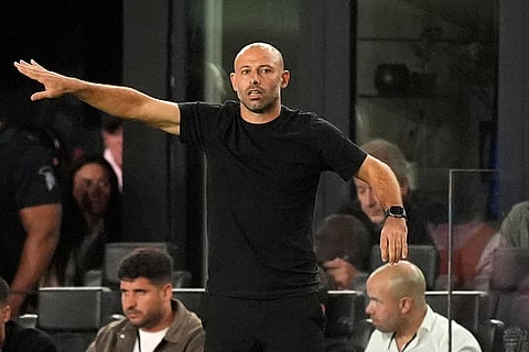Inter Miami head coach Javier Mascherano gestures to his players from the sideline during the first half of an MLS Eastern Conference final soccer match against New York City FC in Fort Lauderdale, Florida. 