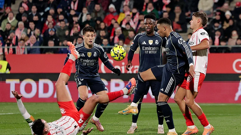 Real Madrid players in action. - null