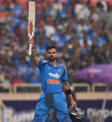 India's Virat Kohli celebrates his century during the first One Day International match between India and South Africa in Ranchi.