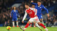 | Photo: AP/Ian Walton : Chelsea's Enzo Fernandez challenges for the ball with Arsenal's Martin Zubimendi during the English Premier League match on November 30, 2025.