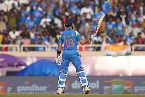 India's Virat Kohli celebrates his fifty runs during the first One Day International match between India and South Africa in Ranchi.