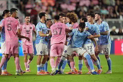 New York City FC and Inter Miami players, including defender Marcelo Weigandt (57), who received a yellow card, fight during the first half of an MLS Eastern Conference final soccer match, in Fort Lauderdale, Florida. 