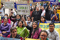 Vasant Kunj B-1 Residents Protest Against High-Rise Tower | Photo: PTI/Karma Bhutia : Residents of Sector B, Pocket 1, Vasant Kunj, raise slogans during a protest against the proposed construction of multi-storey buildings in the area, at Jantar Mantar, in New Delhi.