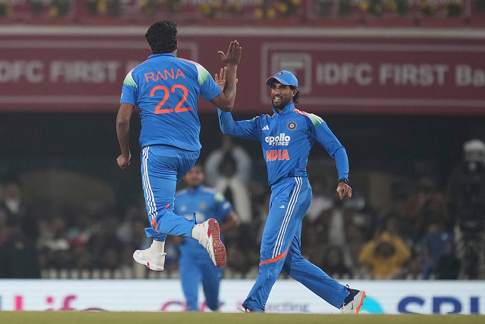 India's Harshit Rana, left , celebrates the wicket of South Africa's Ryan Rickelton during the first One Day International match between India and South Africa in Ranchi. - | Photo: AP/Rafiq Maqbool