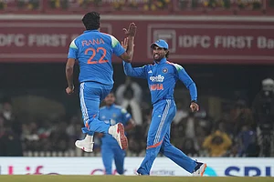 | Photo: AP/Rafiq Maqbool : India's Harshit Rana, left , celebrates the wicket of South Africa's Ryan Rickelton during the first One Day International match between India and South Africa in Ranchi.
