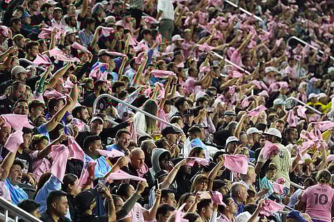Inter Miami fans wave pink banners at the start of an MLS Eastern Conference final soccer match against New York City FC in Fort Lauderdale, Florida. 